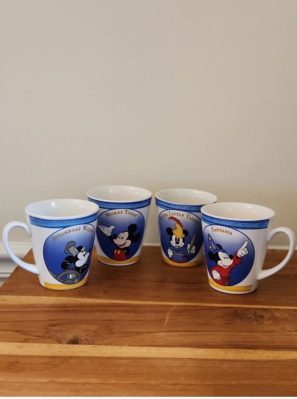 4 Mickey Mouse Disney Ceramic Through The Years Stoneware Coffee Cups 4"